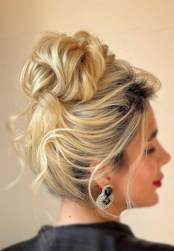 Voluminous Blonde Piled Updo, 90s inspired updo, Pamera Anderson inspired updo, piled updos, trending piled updo hairstyle, trendsetting updo hairstyle