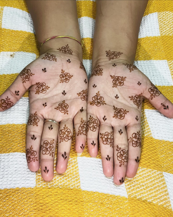 Playful Rosebud Henna, floral henna design, girly henna designs, modern henna design, floral mehndi design