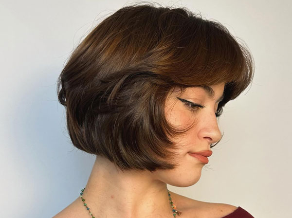 27 French Hairstyles for a Chic Makeover: Polished French Bob with Curved Ends