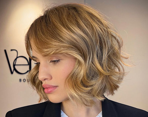 27 French Hairstyles for a Chic Makeover: Sunlit Blonde Textured Bob