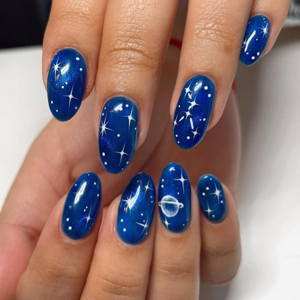 18 Mesmerising Sapphire Blue Nails : Galaxy-Inspired Nail Art Design