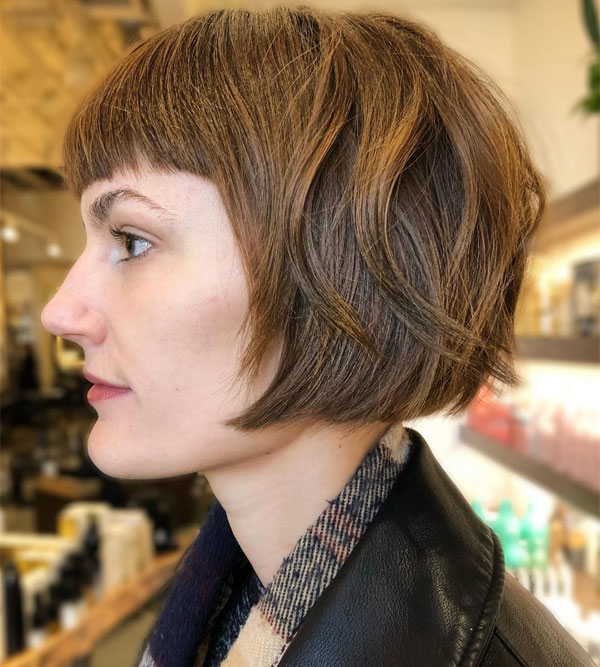 27 French Hairstyles for a Chic Makeover: Choppy French Bob with Micro Bangs