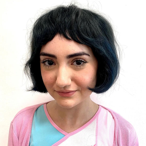 27 French Hairstyles for a Chic Makeover: Micro-Fringed Bob with Midnight Blue Hues